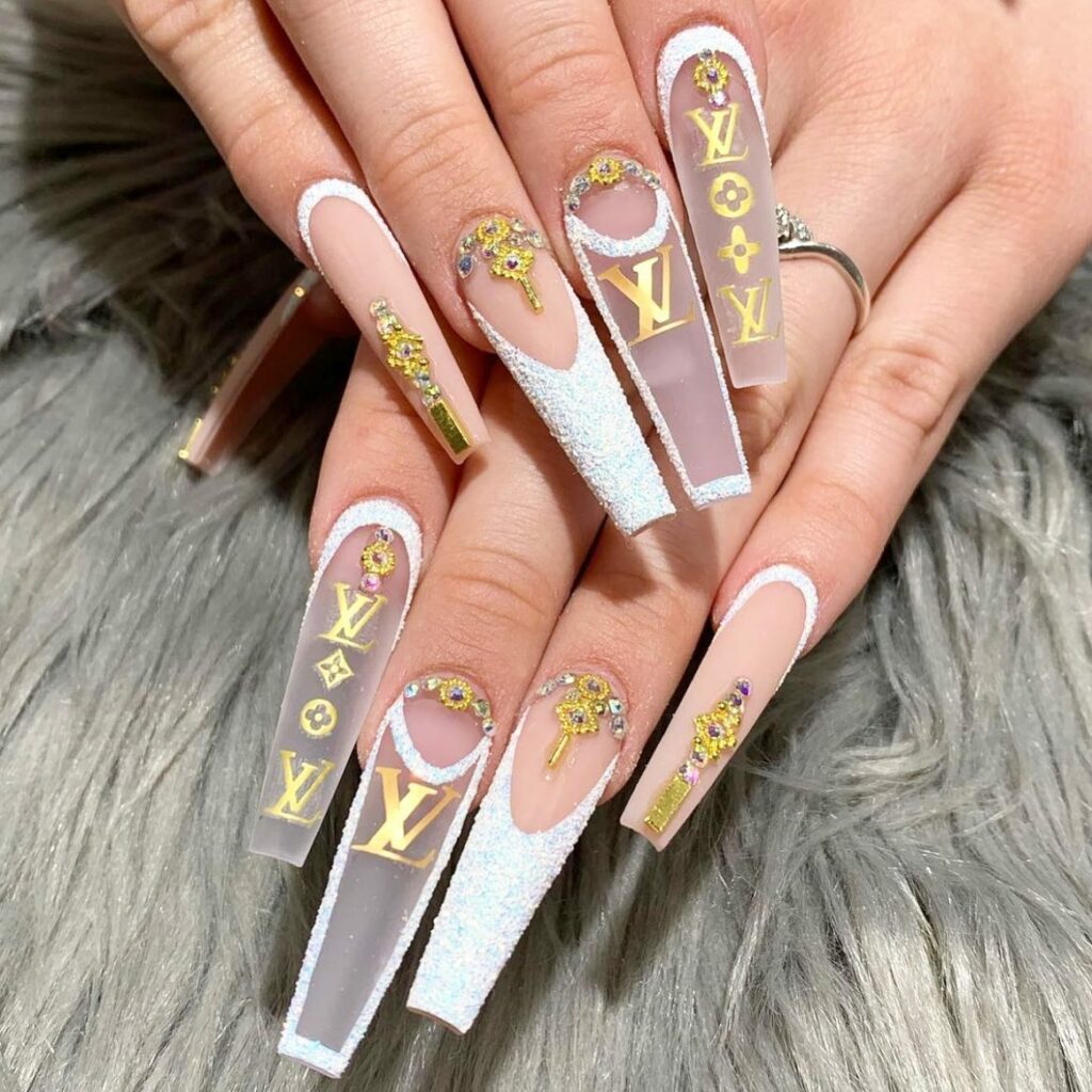 25 Latest Louis Vuitton Nails To Try In 2024 11 Ombré Long White Coffin Nails with Louis Vuitton