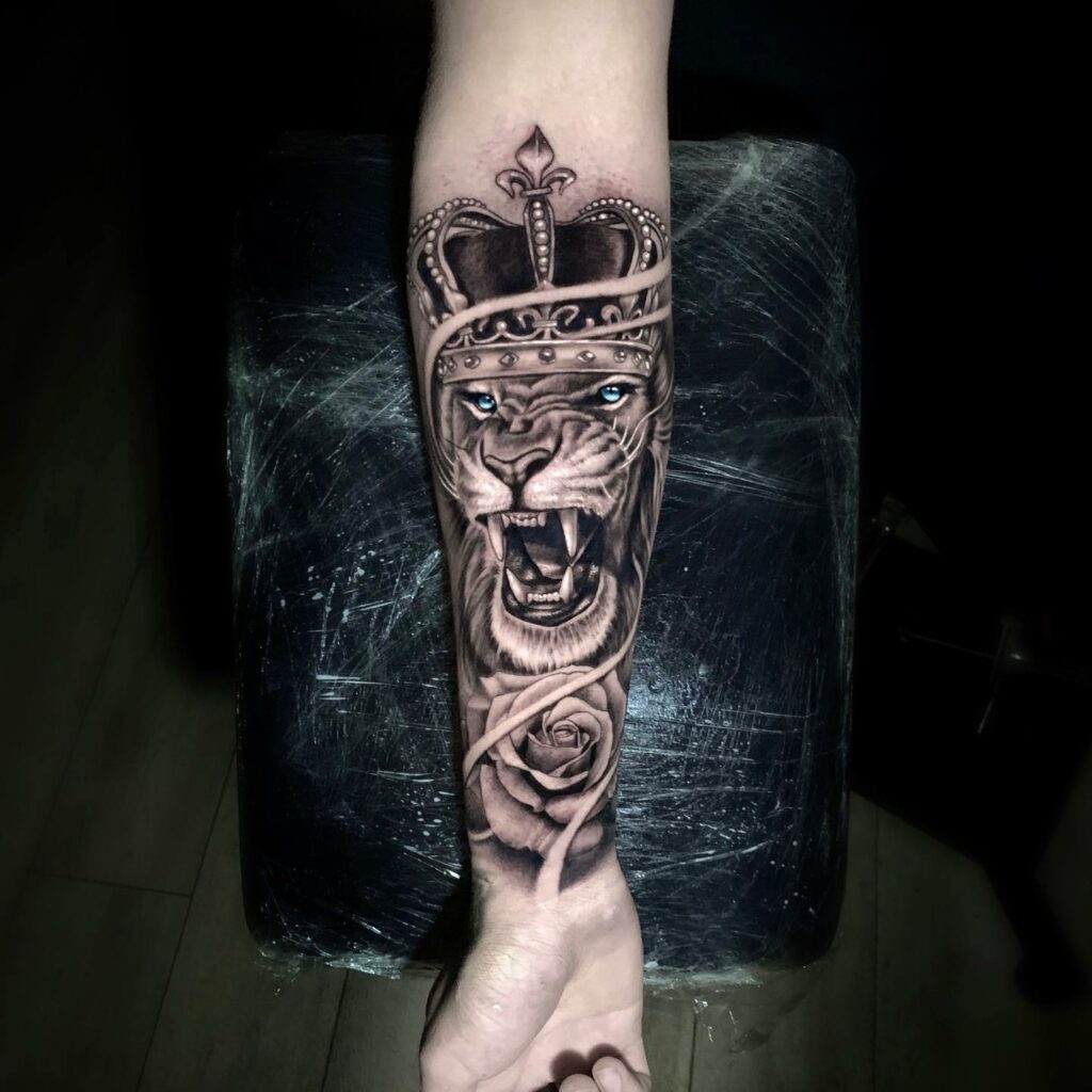 11+ Lion Sleeve Tattoo Ideas That Will blow Your Mind! 13 Roaring Lion Tattoo Along With The Crown Tattoo