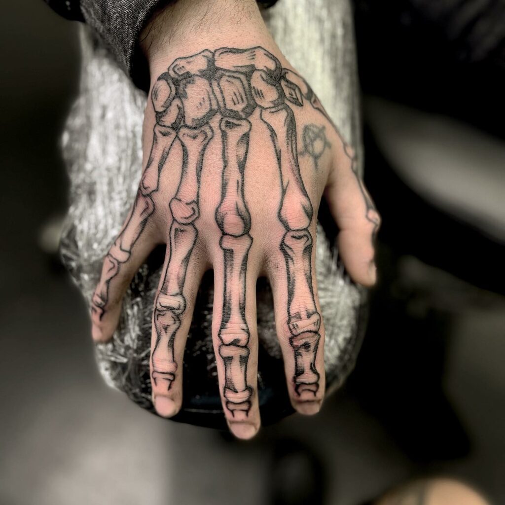 11+ Simple Skeleton Tattoo Ideas That Will Blow Your Mind! 19 Simple skeleton rock hand tattoo ideas
