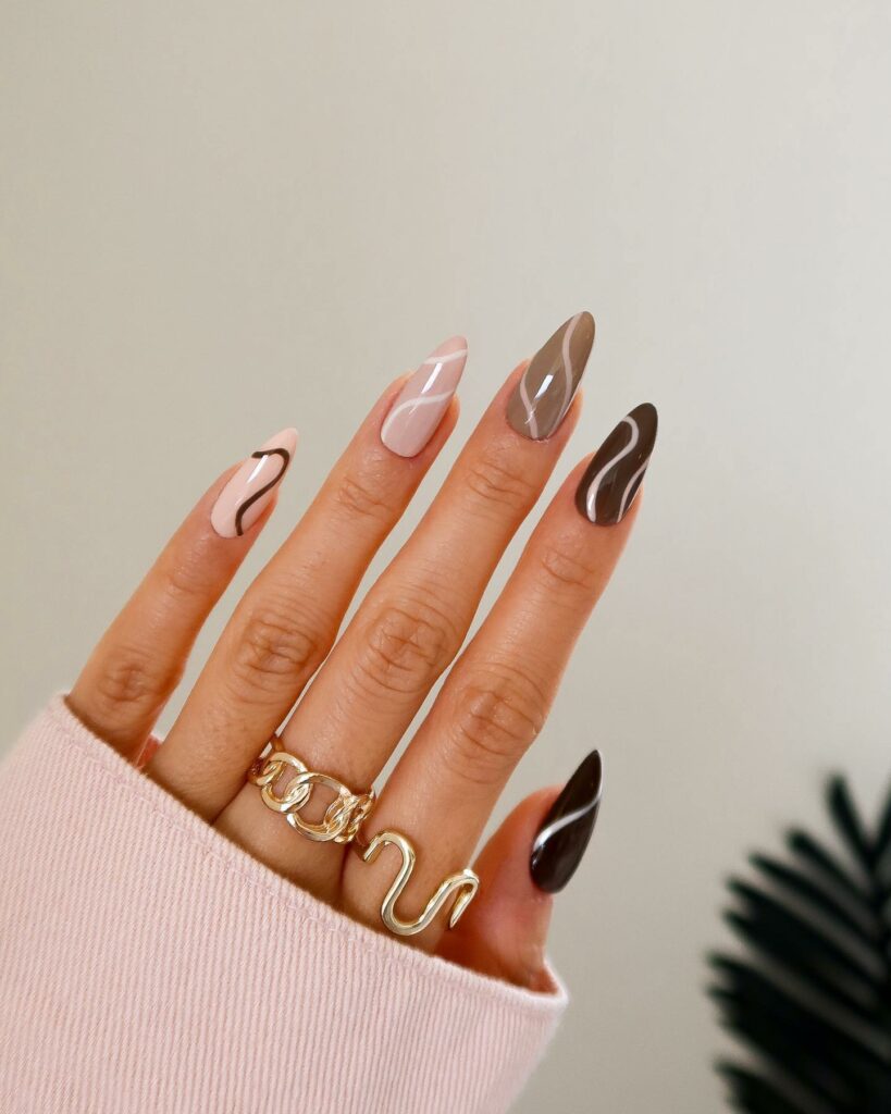 Get Swirly with 35 Swirl Nails Ideas for 2024 14 Brown And Gold Swirl Nails