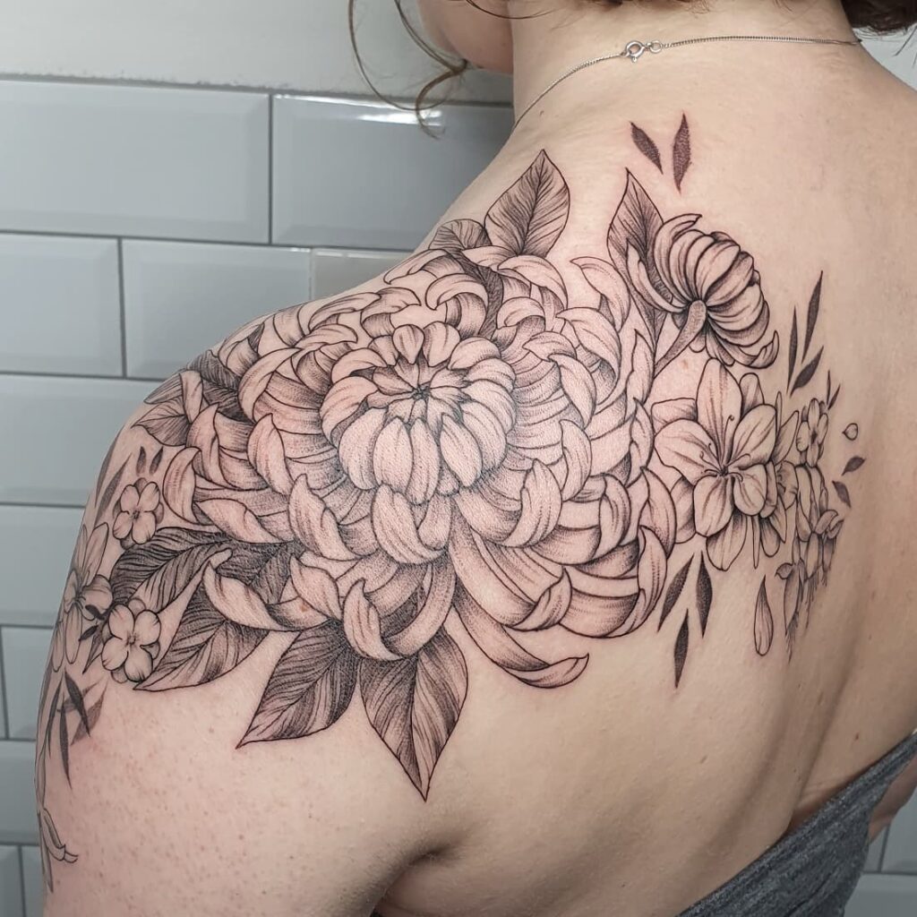 BEAUTIFUL SHOULDER TATTOO IDEAS FOR WOMEN IN 2024 22 Flower Shoulder Tattoo