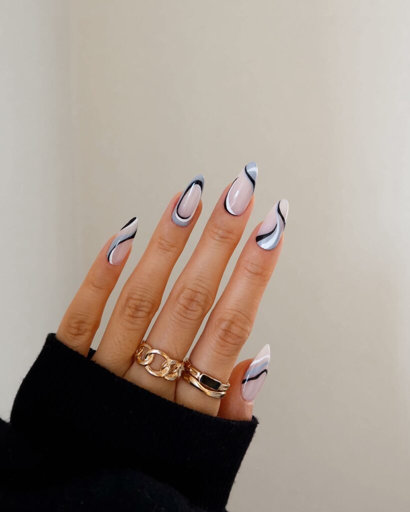 Get Swirly with 35 Swirl Nails Ideas for 2024 32 White And Black Nails with Swirls