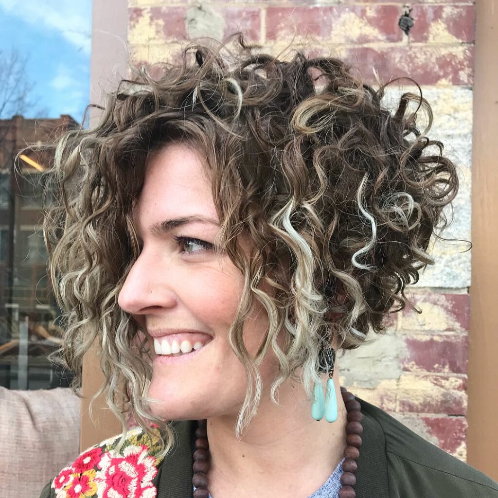 25 Curly Hair Perm Ideas to Transform Your Look in 2024 33 Asymmetrical Bob for the Bold