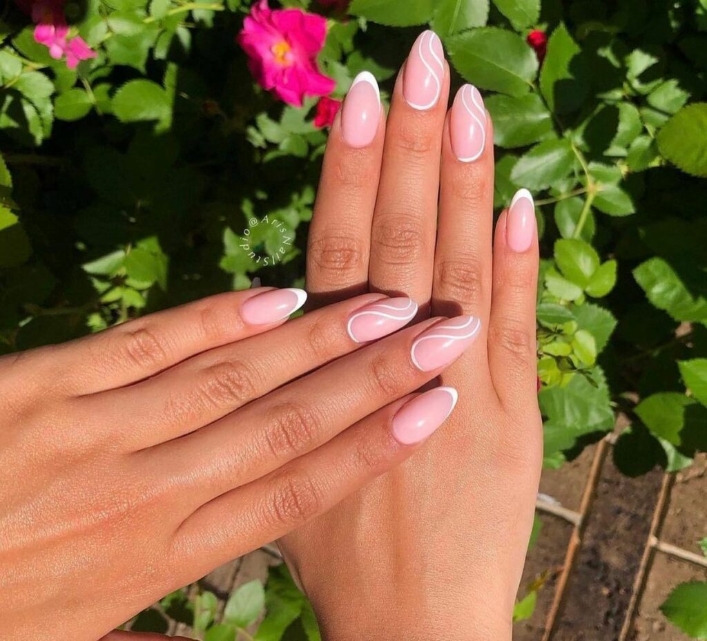 28 Latest Nude And White Nail Designs To Try in 2024! 29 White Swirls On Pink Nails