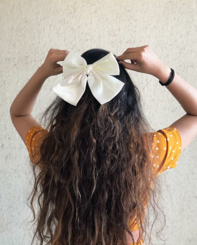 30 Curly Hairstyles Ideas to Flaunt Your Curls in 2024 22 Tied with Ribbons