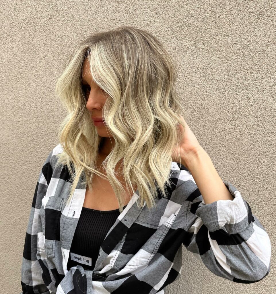 25 Short Layered Haircut Ideas to Revamp Your Look in 2024 18 Face-Framing Lob Cut