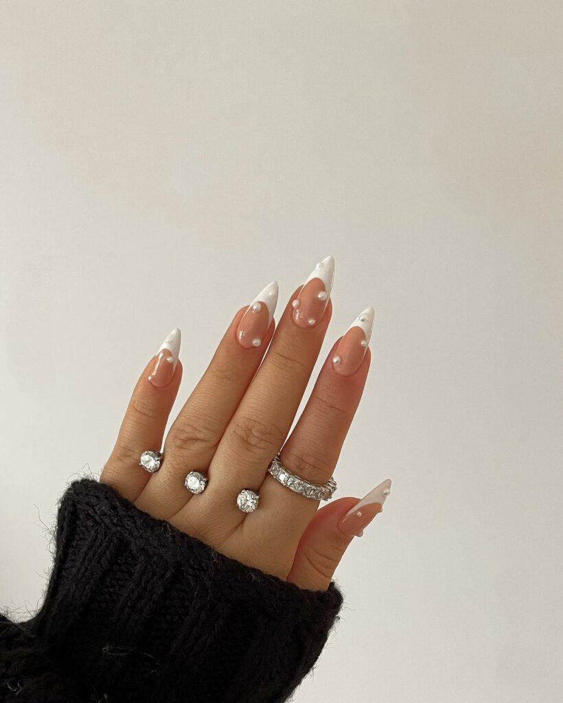 Attend in Style with 25 Wedding Guest Nail Designs in 2024 24 Almond French Wedding Guest Nails With White Pearls