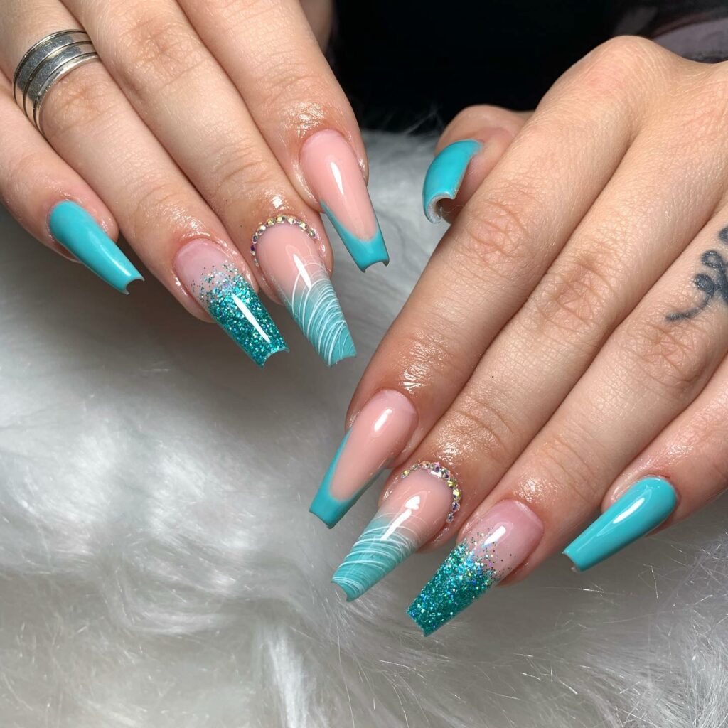 20 Latest Tiffany Blue Nail Ideas To Try In 2024! 24 Tiffany Blue Coffin Nails With Rhinestones And Glitter