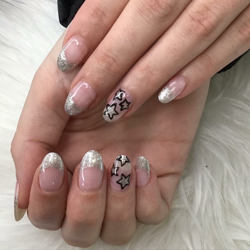 Embrace Glamour with 30 Ombre Nails With Glitter for 2024 27 Starry Glitter Ombré