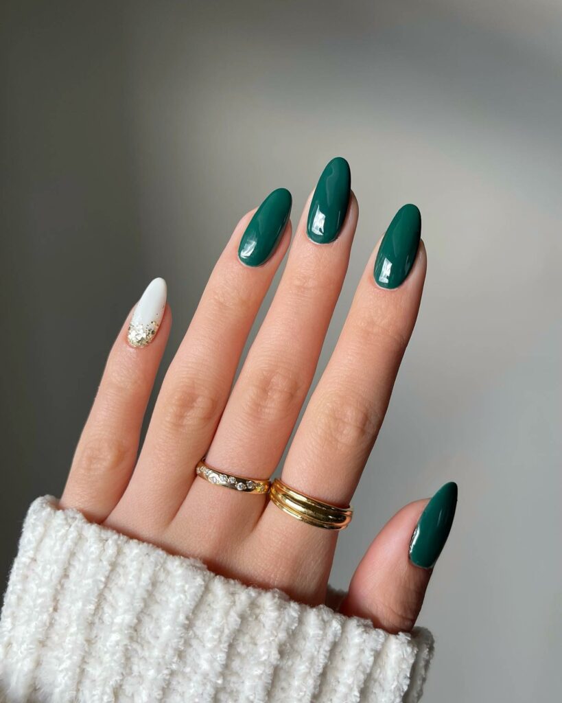 25 Latest Accent Nail Designs To Try In 2024! 24 Green Almond With White Ang Glitters Accent Nails Design