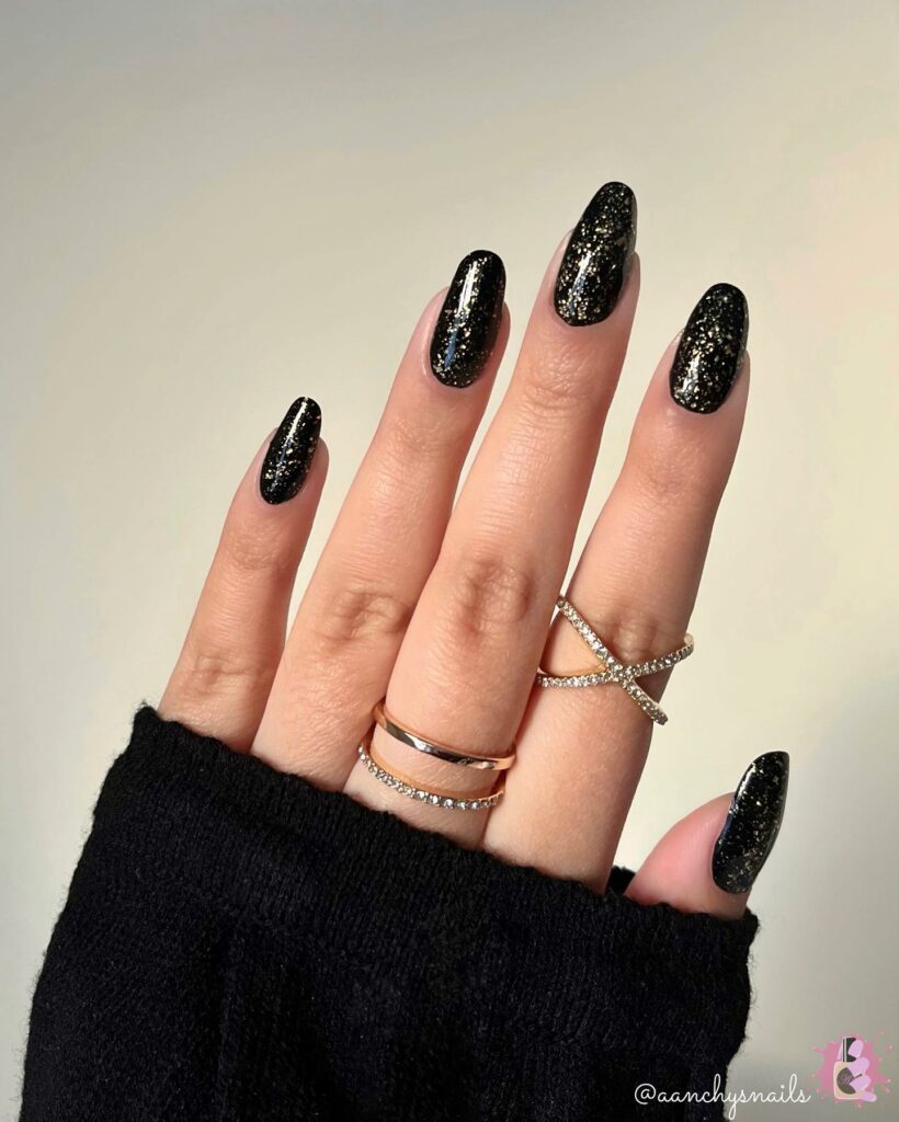 Celebrate with 40 Christmas Statement Nail Designs in 2024 33 Black And Gold Christmas Statement Nails