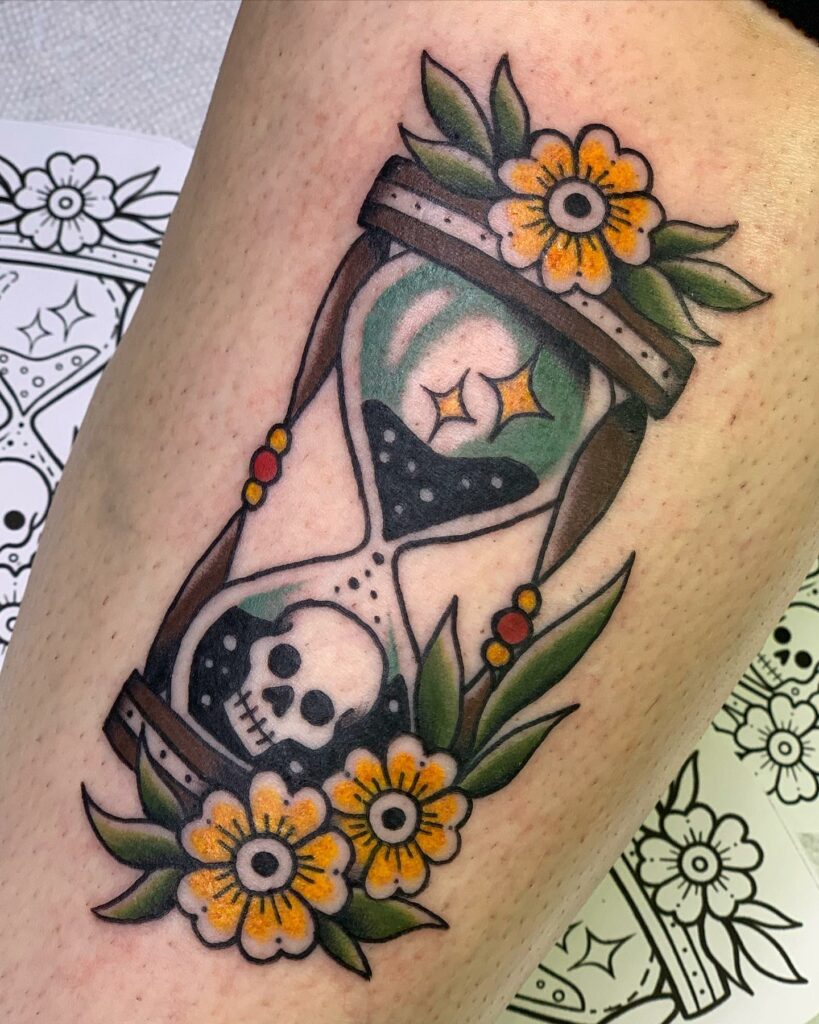 10 AMAZING HOURGLASS TATTOOS & THEIR MEANINGS - UPDATED FOR 2024 15 Floral Hourglass Tattoo