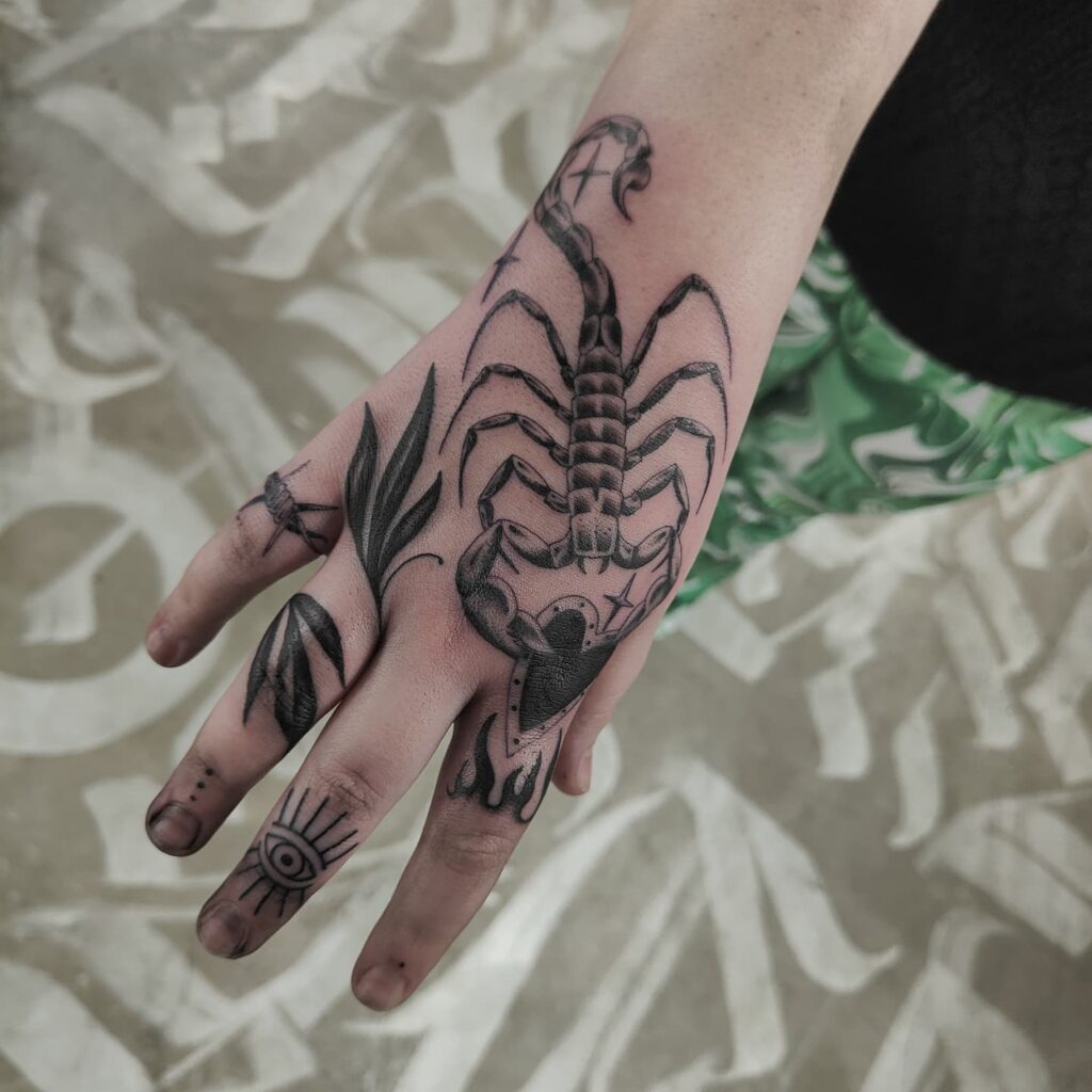 22 AMAZING SCORPION TATTOO DESIGNS - UPDATED FOR 2024 21 Scorpion Hand Tattoo