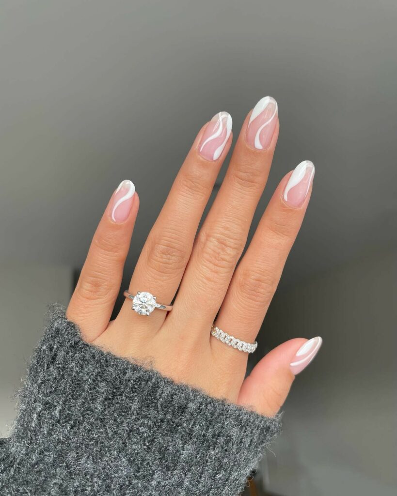 22 Latest Engagement Nail Designs To Try In 2024! 15 White Swirls On Engagement Nails