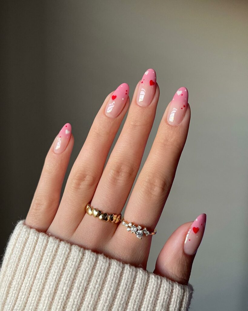 30 Latest Heart Nails Ideas To Try In 2024! 15 Pink Ombre Almond Nails With Tiny Heart Design