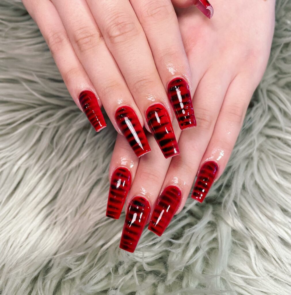 30 Latest Snake Nail Designs To Try In 2024! 17 Glossy Red Snake Skin Nails