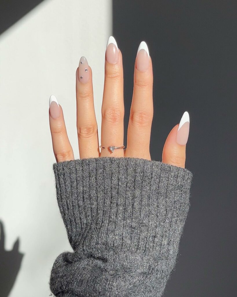 25 Latest Accent Nail Designs To Try In 2024! 15 White French Accent Nails With Rhinestones