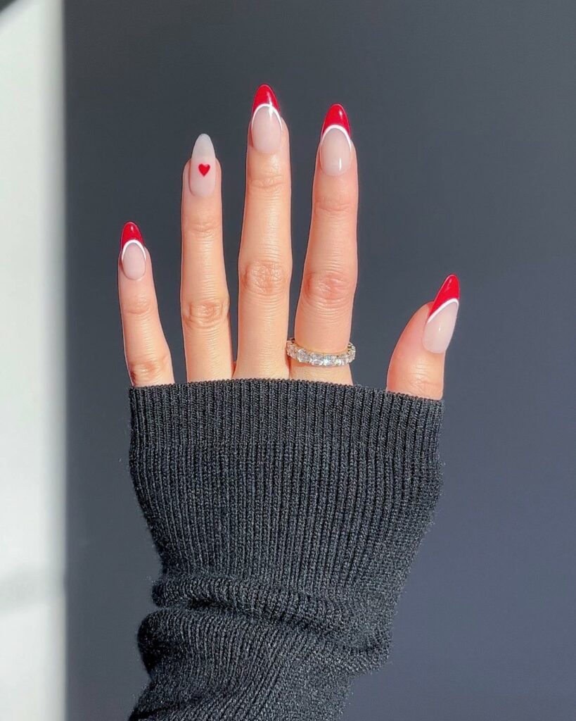 25 Latest Accent Nail Designs To Try In 2024! 13 Red French Accent Nails With Heart