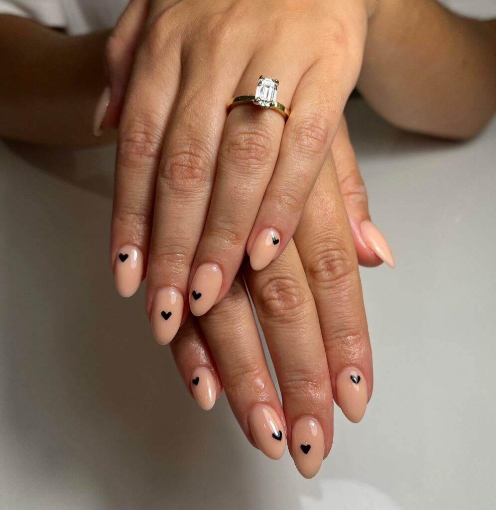 20 Latest Minimalist Nail Ideas To Try In 2024! 29 Minimalist Nails With Tiny Black Hearts Design