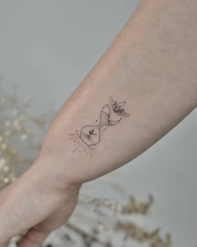12+ Girly Hourglass Tattoo Ideas To Inspire You! 15 The Small Girly Hourglass Tattoo With Flowers