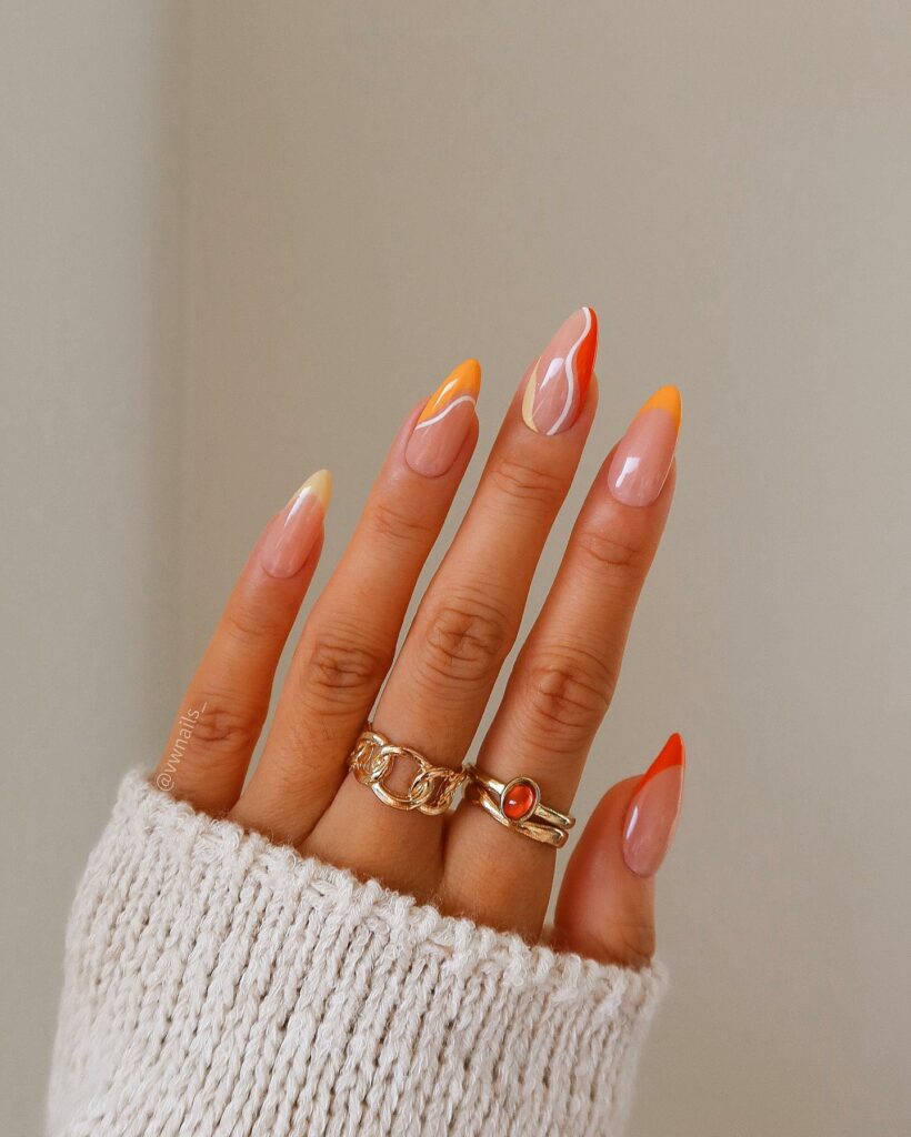 Bring Sunshine with 20 Orange French Tip Nail Designs in 2024 16 Abstract Orange French Tip Nails With Swirl