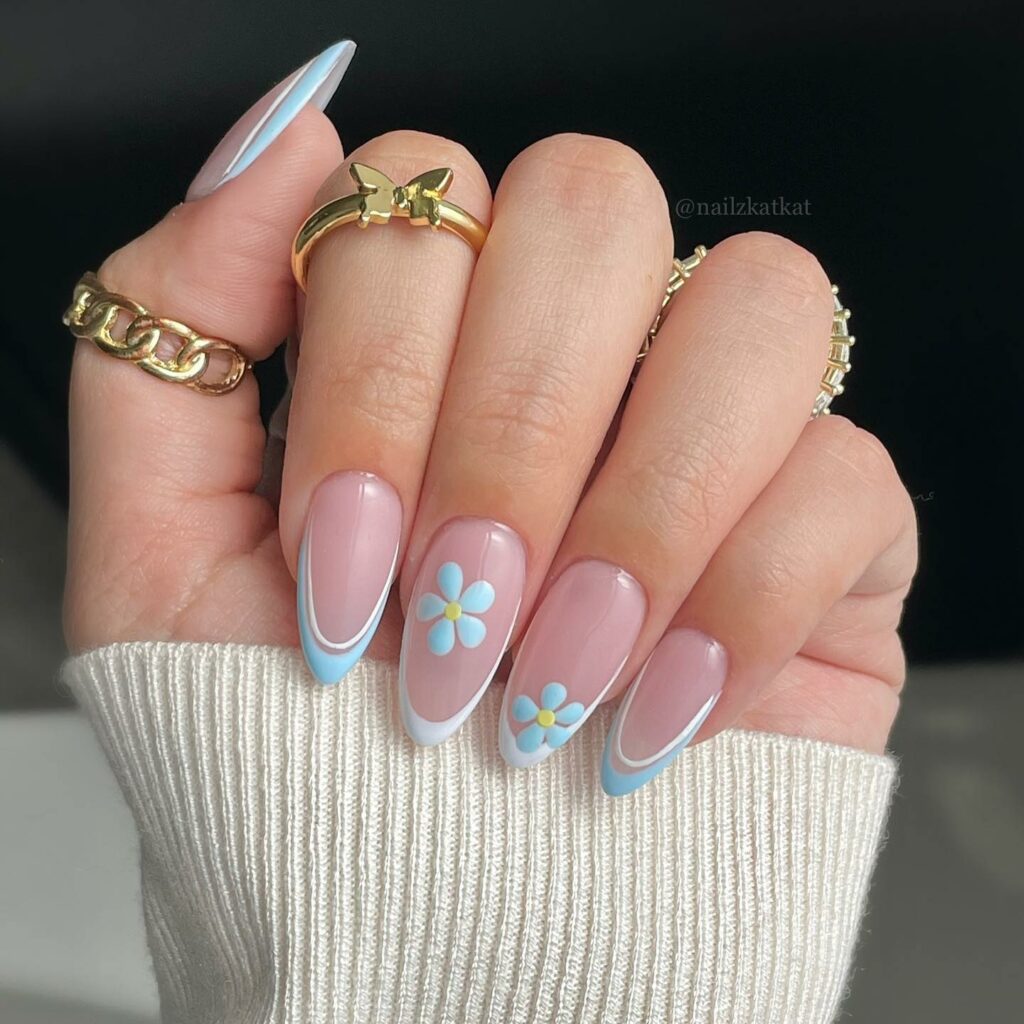 30 Latest Blue And White Nail Ideas To Try In 2024! 32 Light Blue And White French Nails With Flower Design