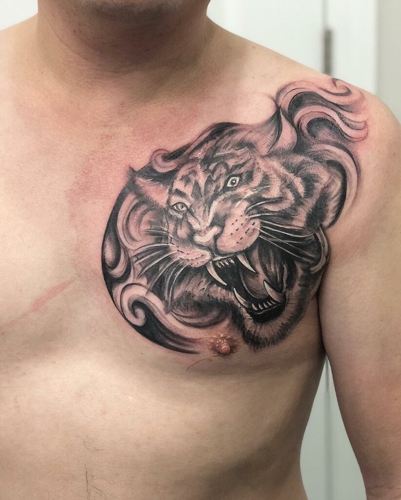 10 Amazing Chest Tattoos For Men + Meanings - updated for 2024 15 Bright and Noticeable Male Chest Tattoos with a Tiger