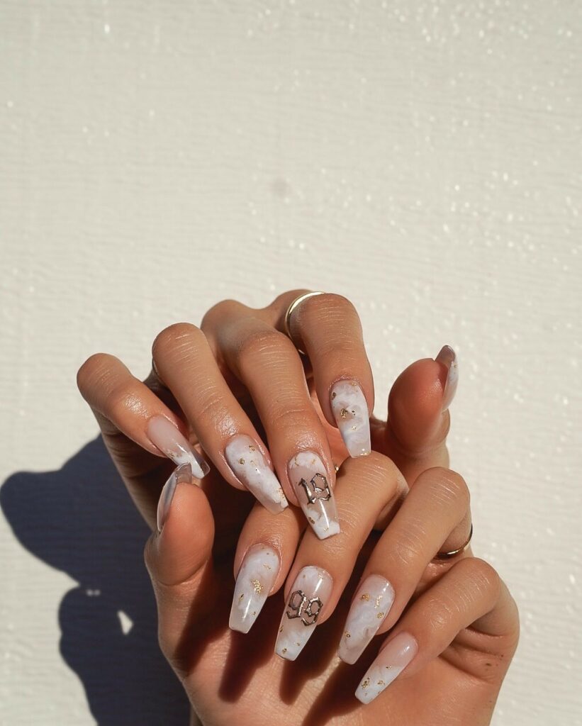 Embrace Elegance with 15 White Marble Nail Designs in 2024 14 White And Brown Marble Nails With 1999 Design