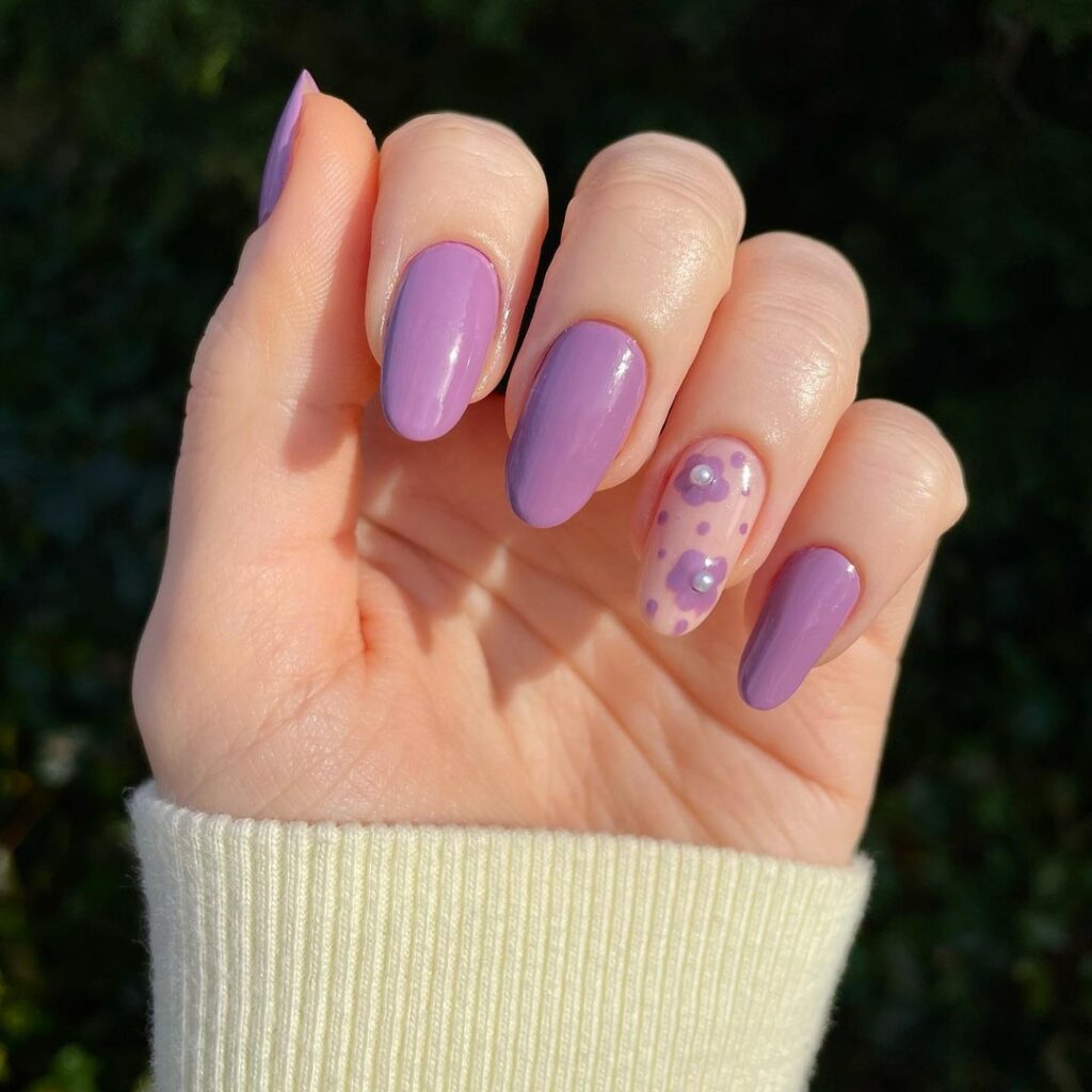 25 Latest Accent Nail Designs To Try In 2024! 30 Purple Accent Nails With Flower