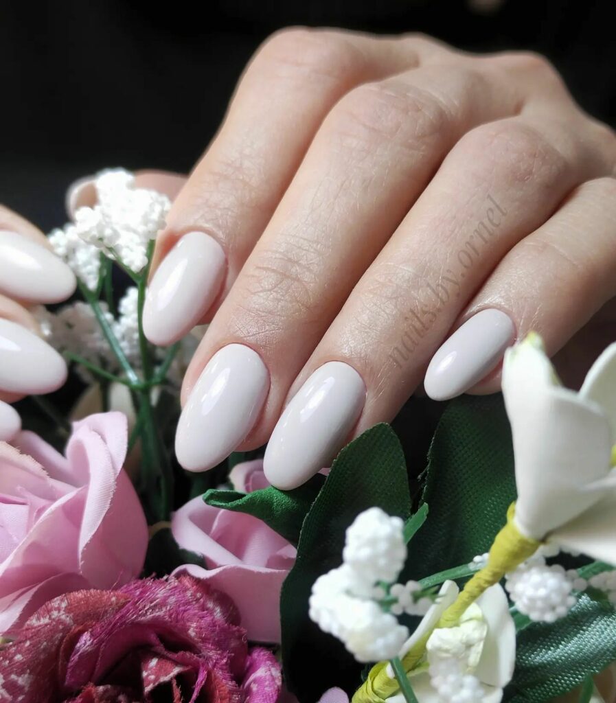 Attend in Style with 25 Wedding Guest Nail Designs in 2024 31 White Almond Wedding Guest Nails