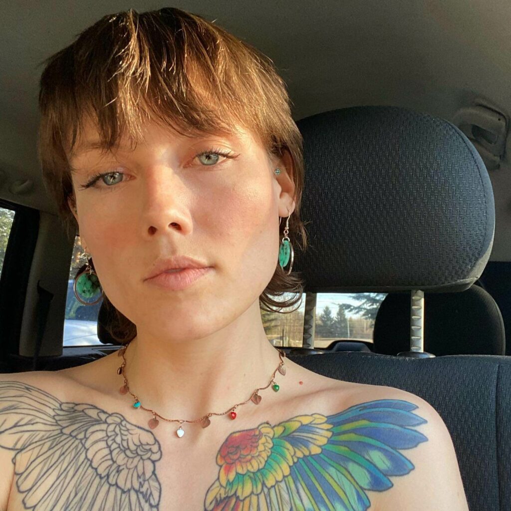 11+ Chest Wing Tattoo Ideas That Will Blow Your Mind! 11 The Dichotomy Of Both Colorful And Black Wings Tattoos