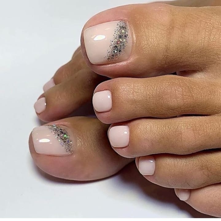 Add Sparkle with 25 Sparkly Toe Nails for 2024 10 Sparkly Glitters On Nude Color Nail