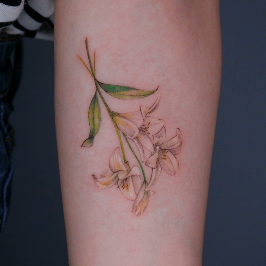 AMAZING LILY TATTOO DESIGNS + A DEEP DIVE INTO THEIR MEANINGS IN 2024 12 White Lily Tattoo