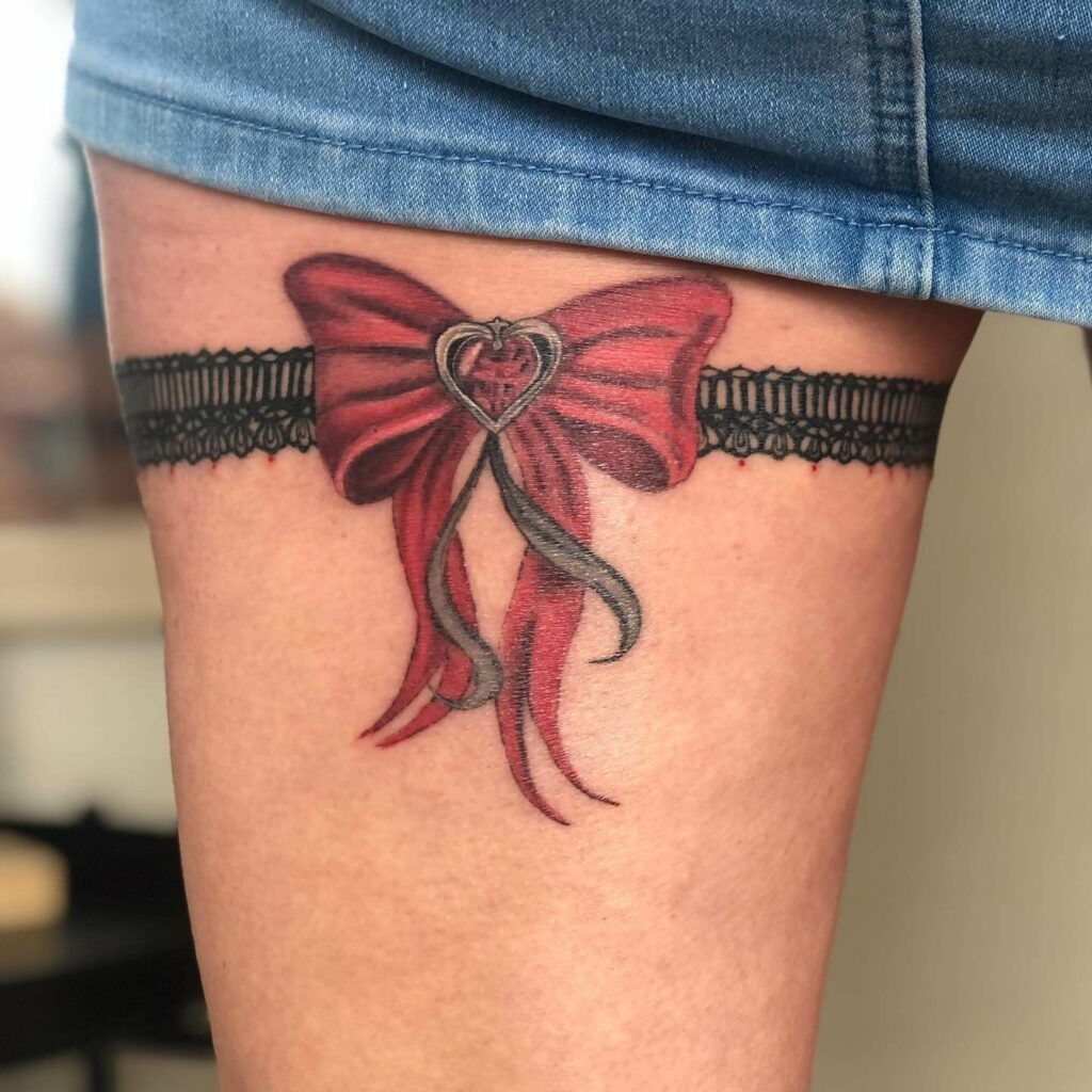 11+ Thigh Bow Tattoo Ideas That Will Blow Your Mind! 14 Tattoo With Garter And Bow On Front Of Thigh