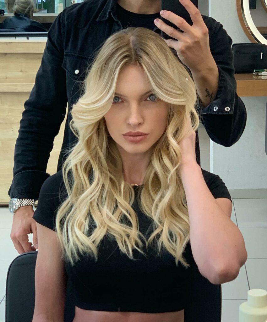 25 Butterfly Haircut Ideas to Elevate Your Style in 2024 14 Golden Blonde Butterfly Cut