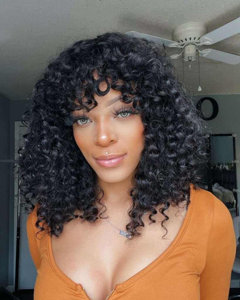 30 Medium Length Hairstyles Blonde Ideas to Try in 2024 13 Shoulder-Grazing Curls