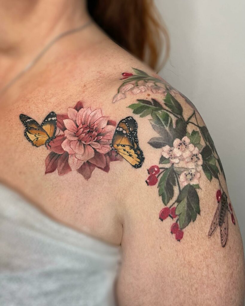 BEAUTIFUL SHOULDER TATTOO IDEAS FOR WOMEN IN 2024 16 Half Chest & Shoulder Tattoo With Flowers