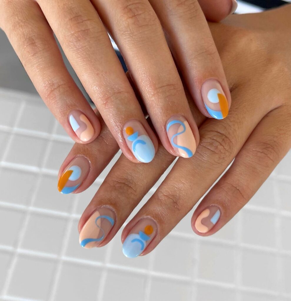 20 Latest Orange And Blue Nail Ideas To Try In 2024! 29 Orange And Blue Short Abstract Nails