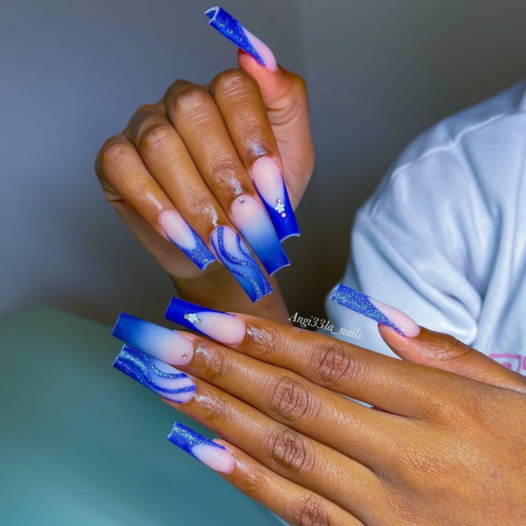 20 Latest Royal Blue Ombre Nail Designs To Try In 2024! 24 Royal Blue Ombre Coffin Nails With Rhinestones And Swirl