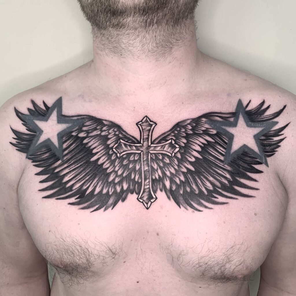 10 Amazing Chest Tattoos For Men + Meanings - updated for 2024 12 Ideas for Men’s Chest Tattoos with Wings