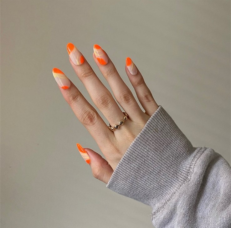 Bring Sunshine with 20 Orange French Tip Nail Designs in 2024 23 Almond Orange French Tip Nails With Abstract Design