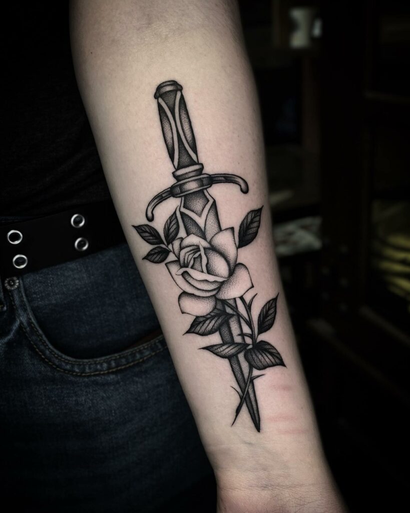 12+ Traditional Dagger Tattoo Ideas - To Inspire You In 2024 12 Rose and Dagger Tattoo