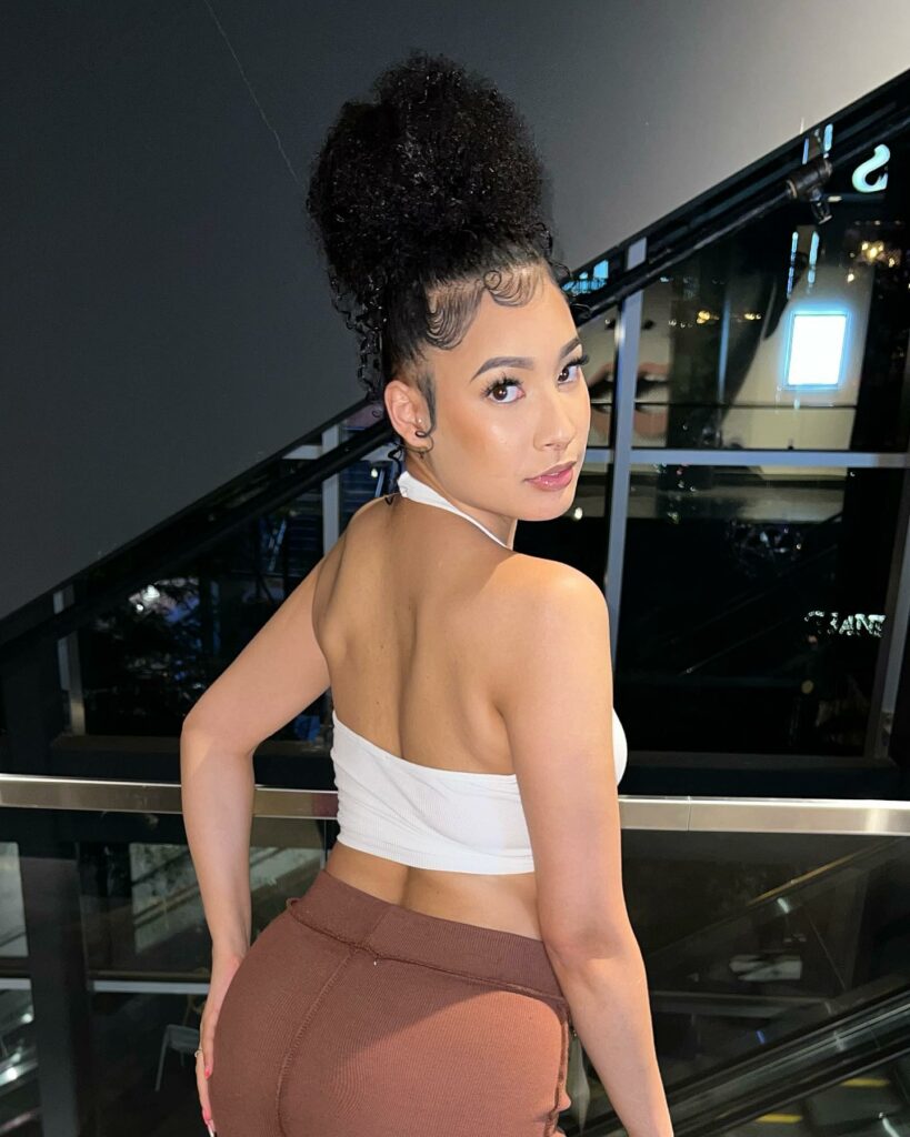 30 Curly Hairstyles Ideas to Flaunt Your Curls in 2024 10 Messy Topknot Glow-Up