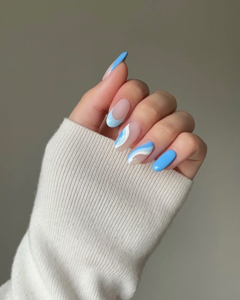 20 Latest Blue Almond Nails Ideas To Try In 2024! 19 Wavy Blue Almond Nails