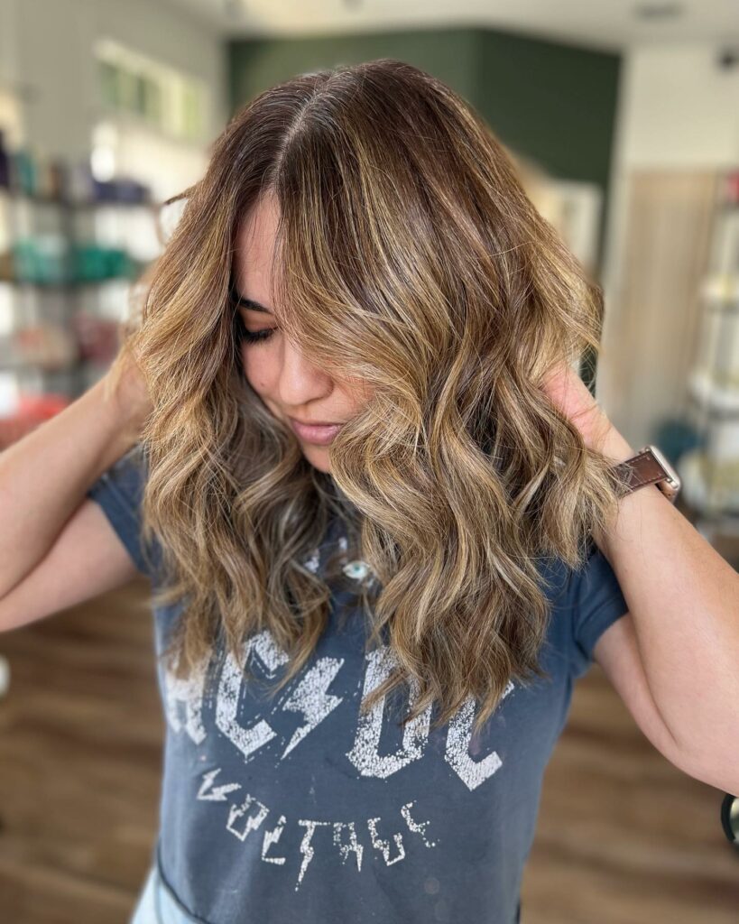 35 Long Wolf Cut Hairstyle Ideas to Try in 2024 21 Mid-Length Wolf Cut with Shadow Roots