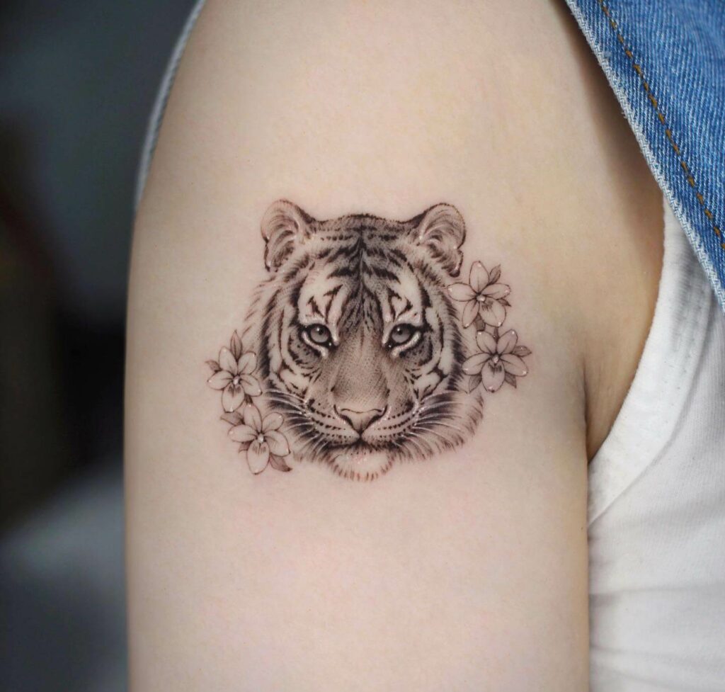 10+ Women's Feminine Tiger Tattoo Ideas That Will Blow Your Mind! 16 Floral Minimal Realistic Tiger Tattoo