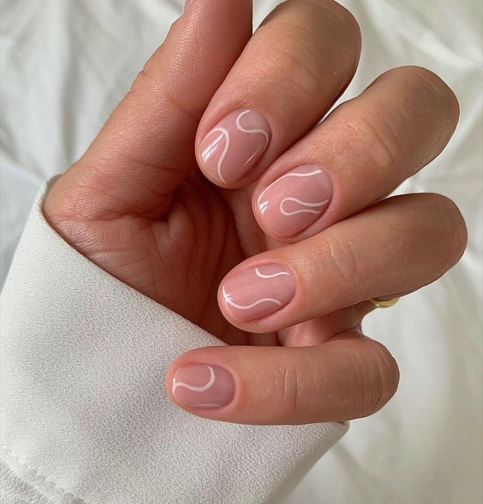 20 Latest Minimalist Nail Ideas To Try In 2024! 10 Minimalist Short Nails With Thin Swirl Design