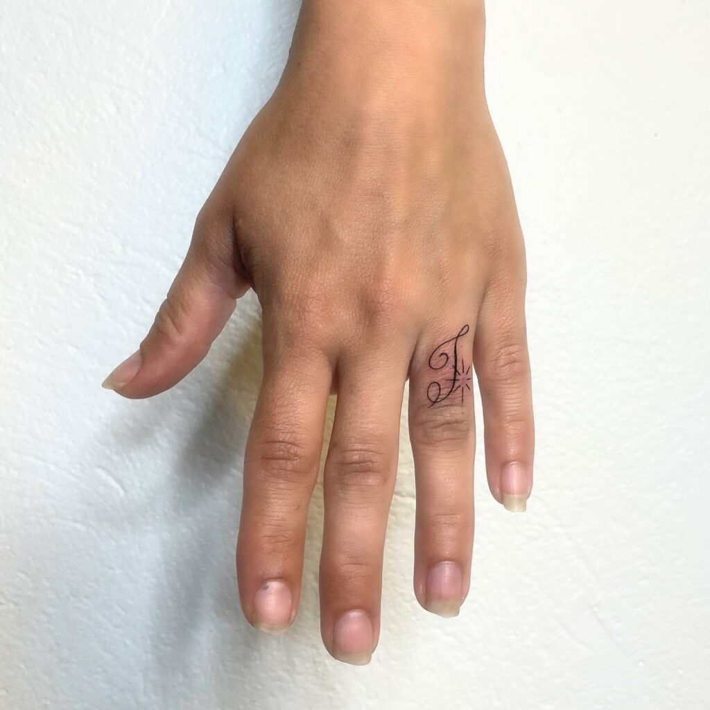 10 Best Wedding Ring Tattoo Ideas - Updated For 2024 18 Script Ring Tattoo Designs