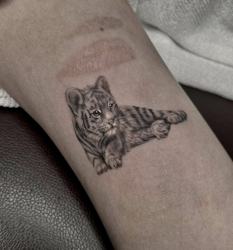 10+ Women's Feminine Tiger Tattoo Ideas That Will Blow Your Mind! 11 Adorable Tiger Cub Realistic Tiger Tattoo