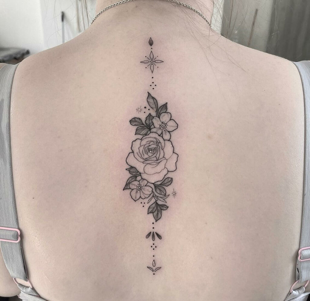 10+ Rose Spine Tattoo Ideas That Will Blow Your Mind! 13 Spine Rose Back Tattoo